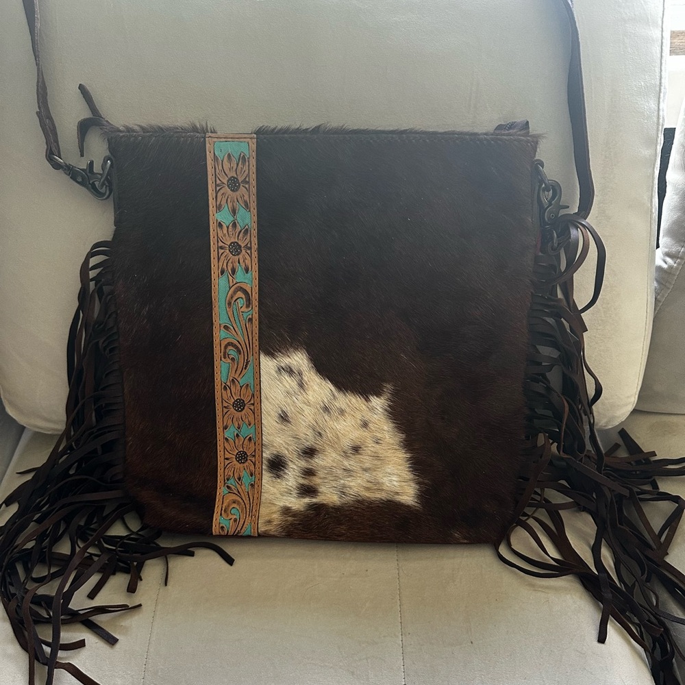 Cow hide/leather with turquoise accents